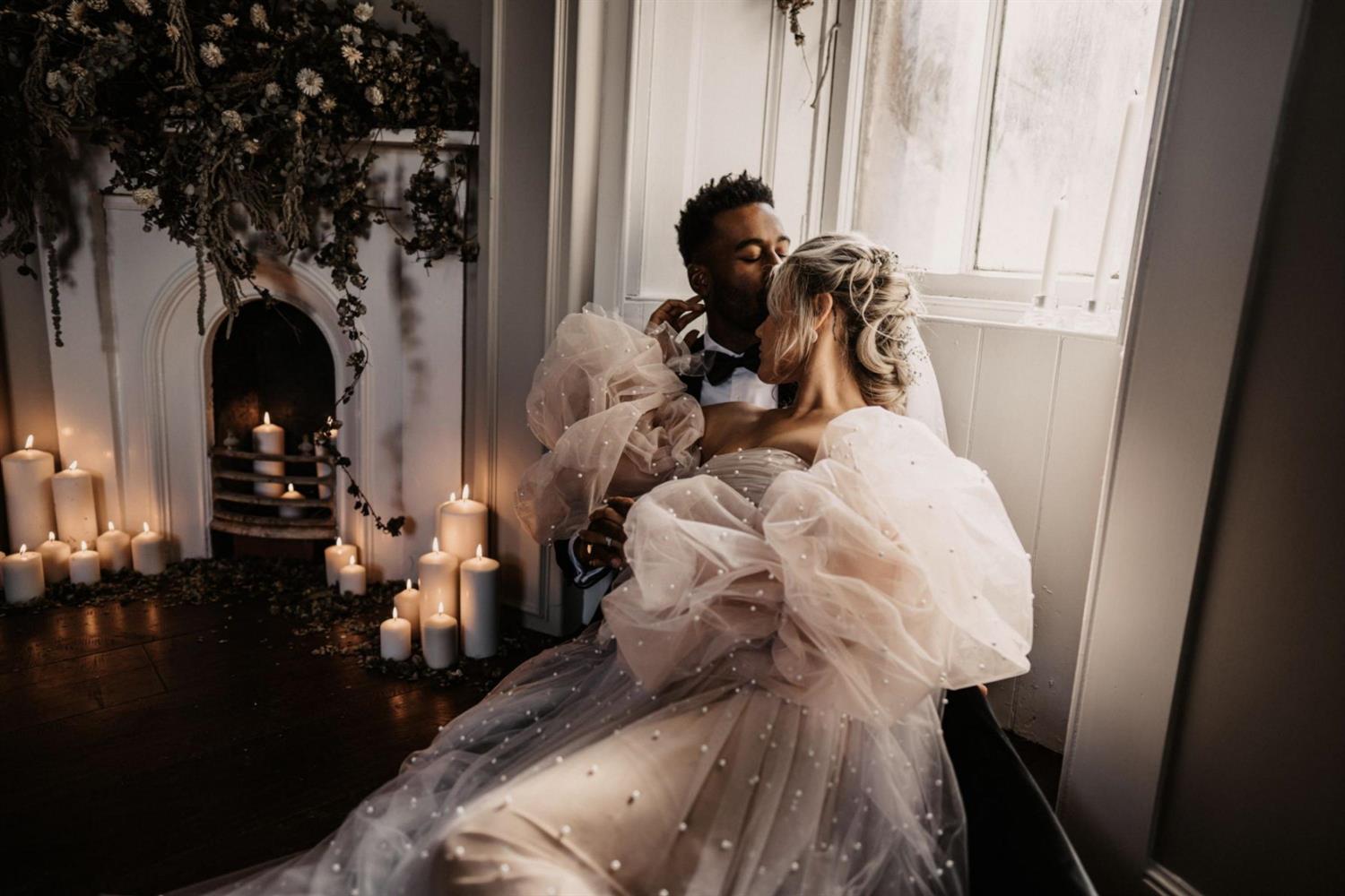 Wedding couple in the turret at Auchen Castle with candles